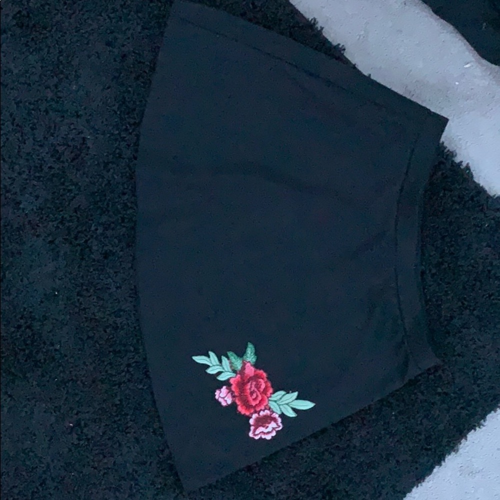 Black skater skirt with embroidered rose